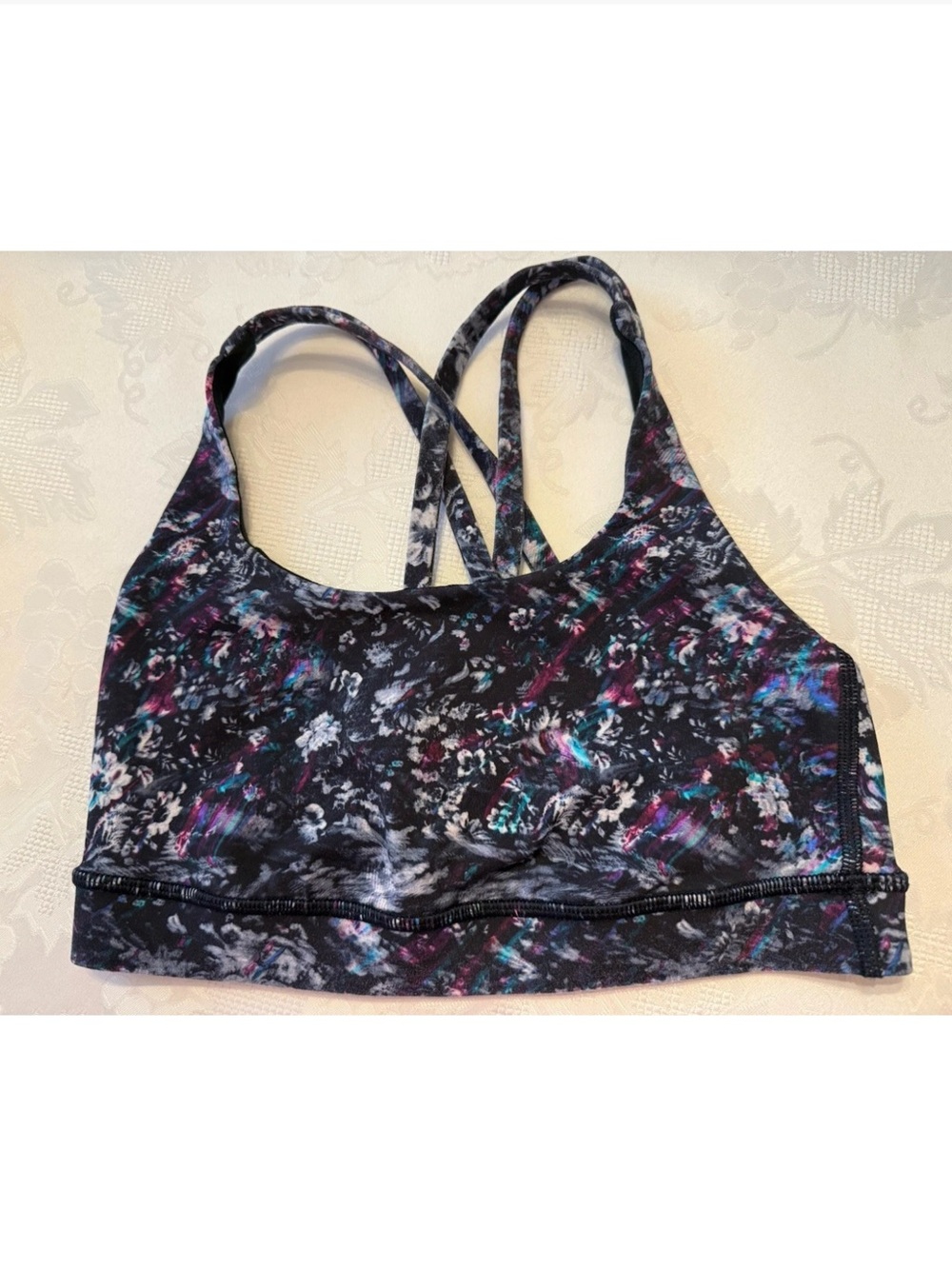 Lululemon woman’s sports bra Illuminate
Blue/Black Multi size 4